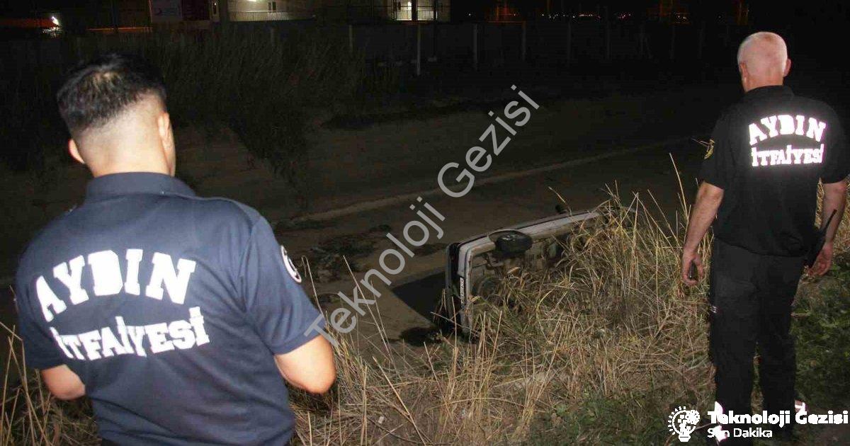 "Aydın'da Korkutan Kaza: Otomobil Sulama Kanalına Uçtu, 2 Yaralı" başlıklı haber için fotorealistik,